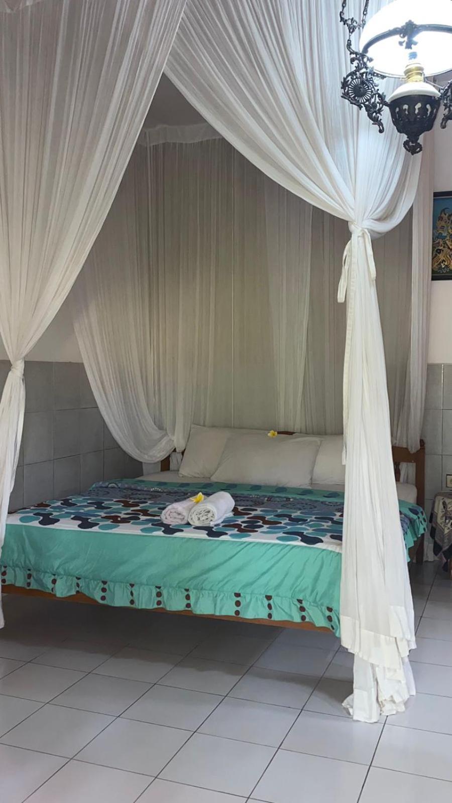 Barclona Guesthouses Lovina Pabean Buleleng Habitación foto